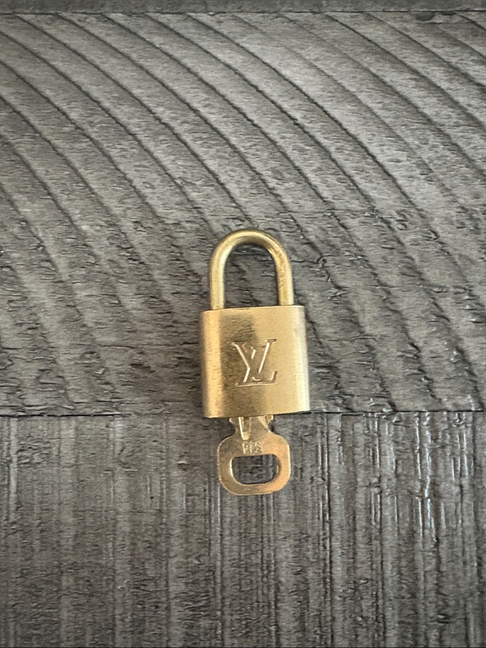 Louis Vuitton Gold Padlock with LV Monogram 314